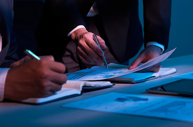 Corporate team review pension plans