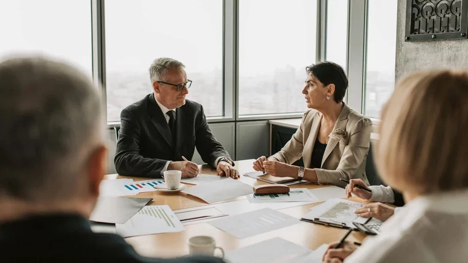 Compliance expert reviewing guidelines